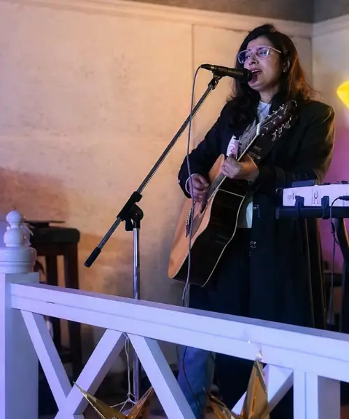 Live wedding singer performing at a wedding celebration”